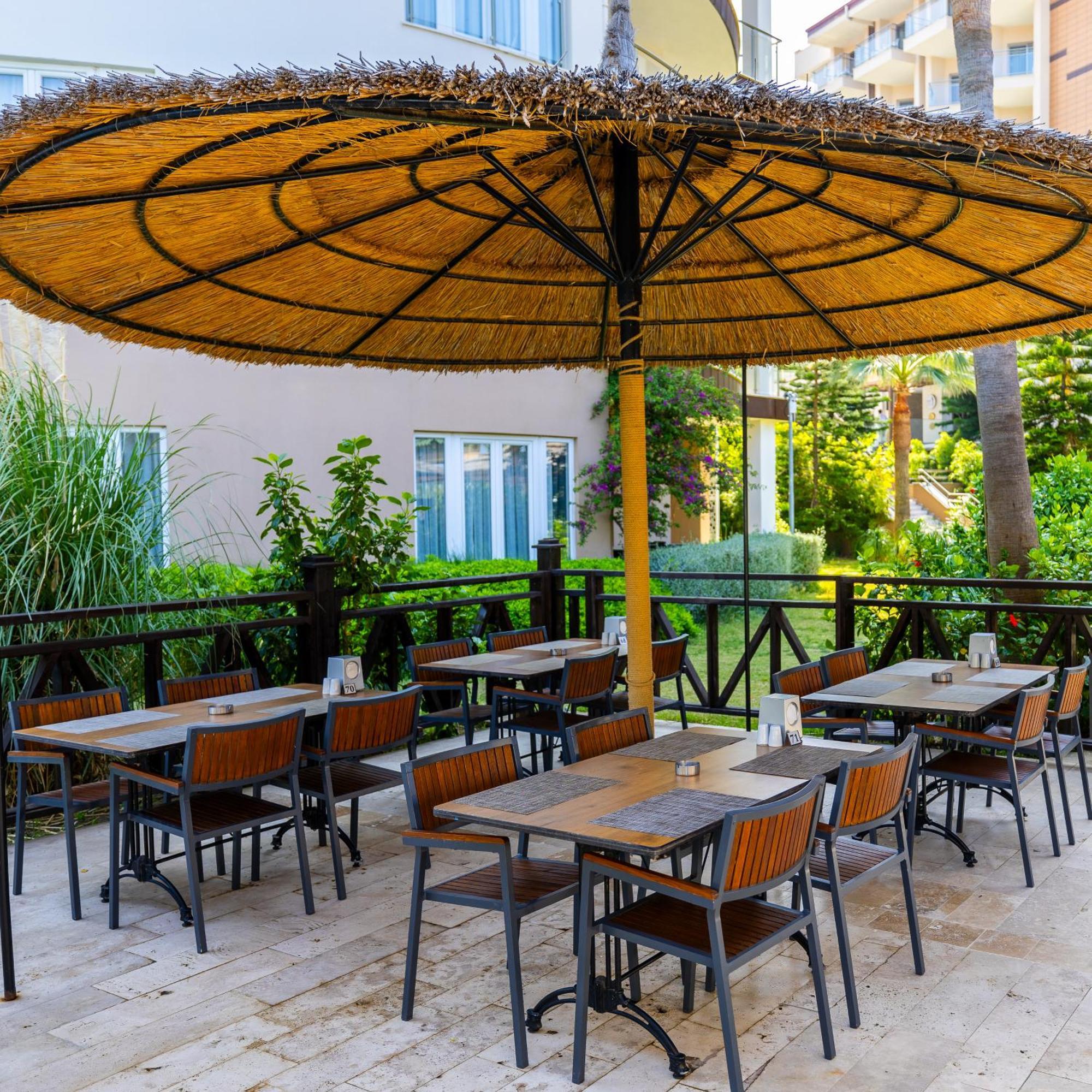 Ramada Resort Kusadasi & Golf Eksteriør bilde A restaurant in Turkey